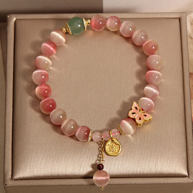 Bracelet de paix œil de chat papillon rose dégradé avec Buddha Stones