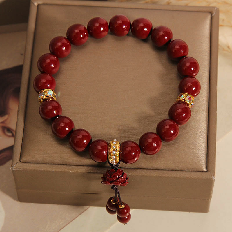 Bracelet à breloques et bénédictions de lotus en Buddha Stones et cinabre