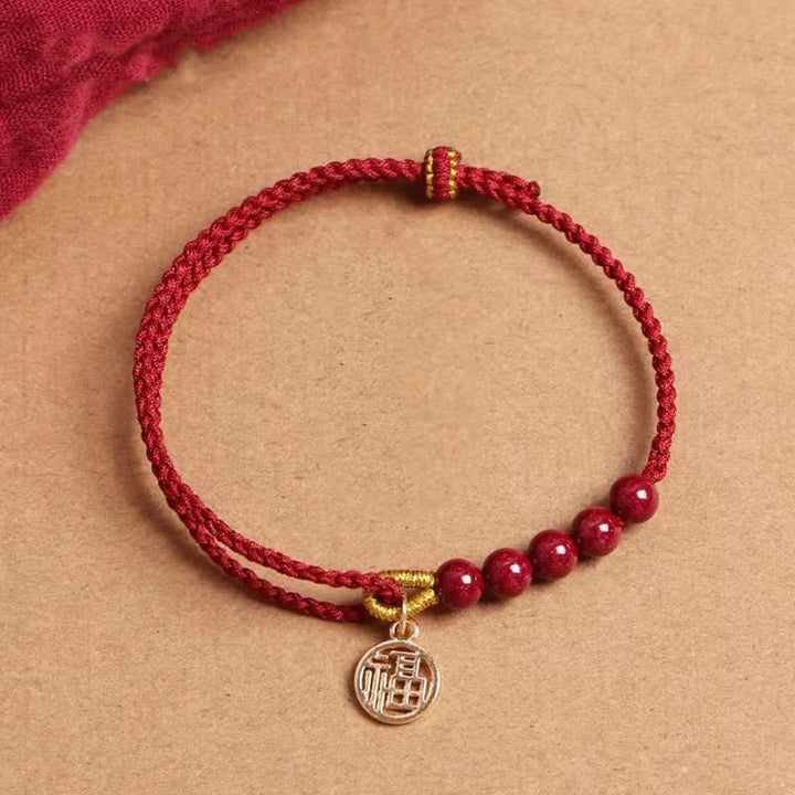 Bracelet tressé fait main en fil rouge avec Buddha Stones