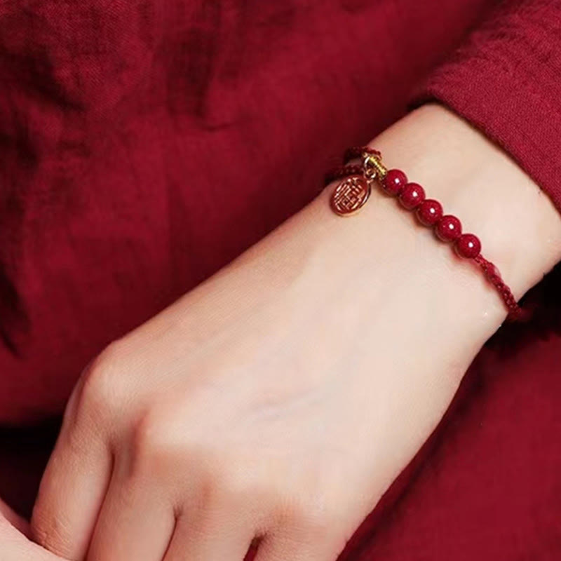 Bracelet tressé fait main en fil rouge avec Buddha Stones