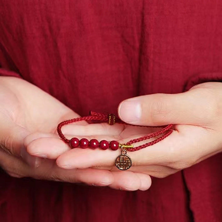 Bracelet tressé fait main en fil rouge avec Buddha Stones