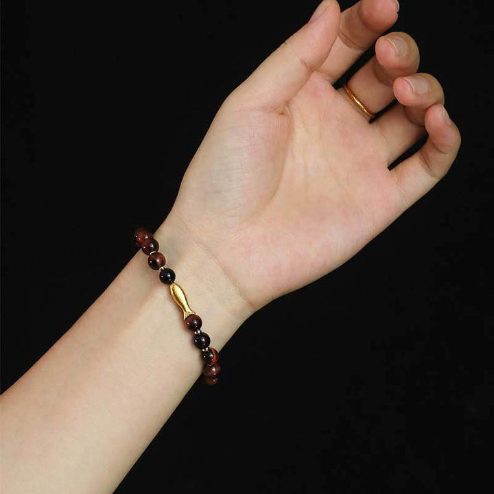 Bracelet courage en Buddha Stones œil de tigre poisson koï