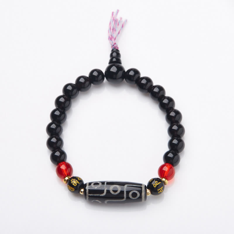 Bracelet Buddha Stones en onyx noir avec perles dzi à neuf yeux et six mots vrais