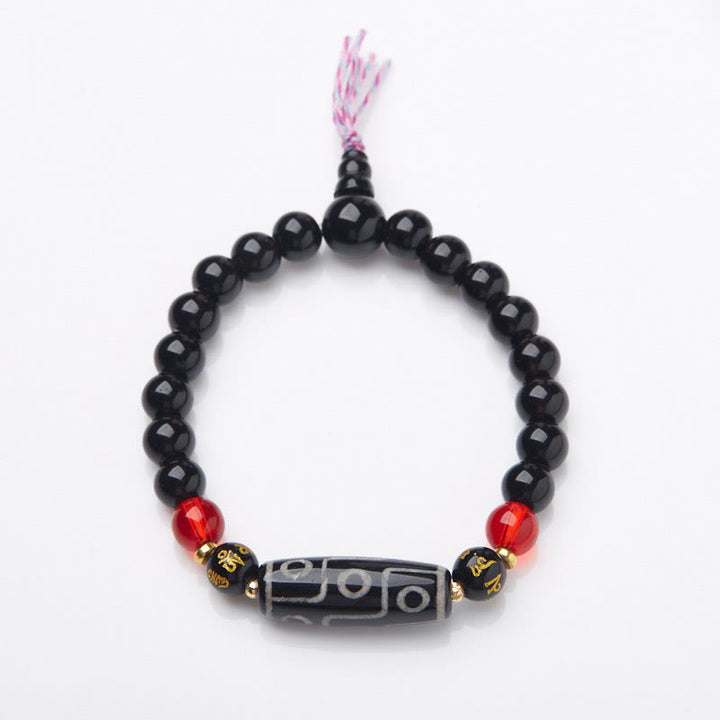 Bracelet Buddha Stones en onyx noir avec perles dzi à neuf yeux et six mots vrais
