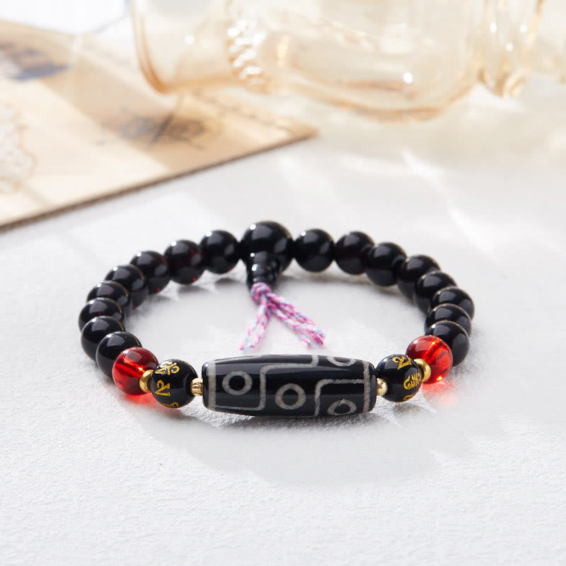 Bracelet Buddha Stones en onyx noir avec perles dzi à neuf yeux et six mots vrais