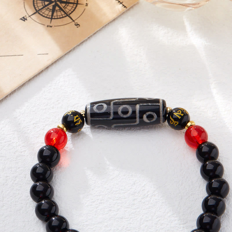 Bracelet Buddha Stones en onyx noir avec perles dzi à neuf yeux et six mots vrais