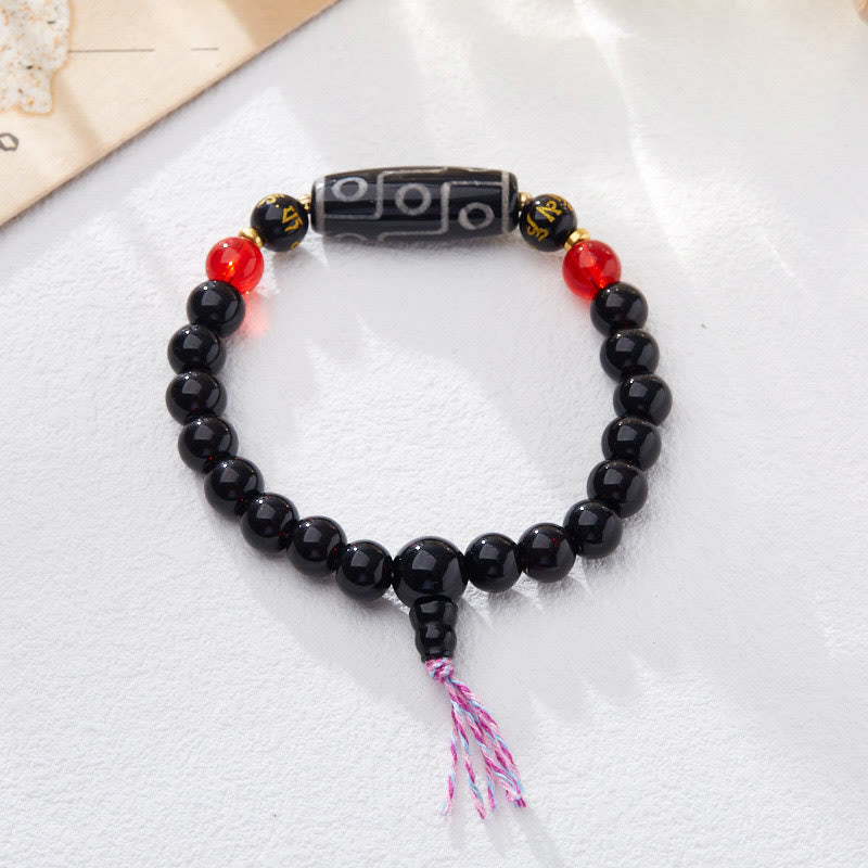 Bracelet Buddha Stones en onyx noir avec perles dzi à neuf yeux et six mots vrais
