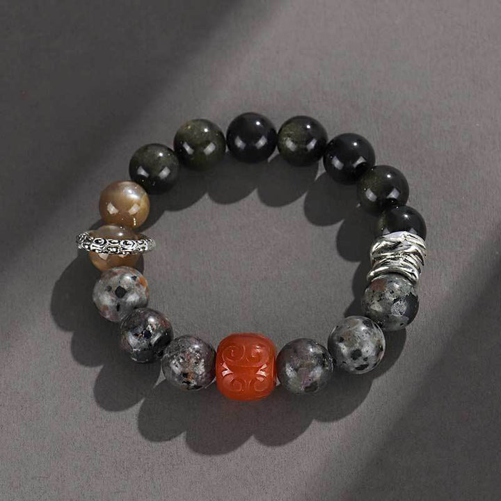 Bracelet de protection en agate rouge et obsidienne brillante dorée avec Buddha Stones