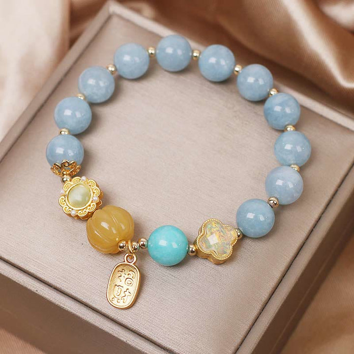 Bracelet de protection de richesse en perles de citrouille et aigue-marine de Buddha Stones