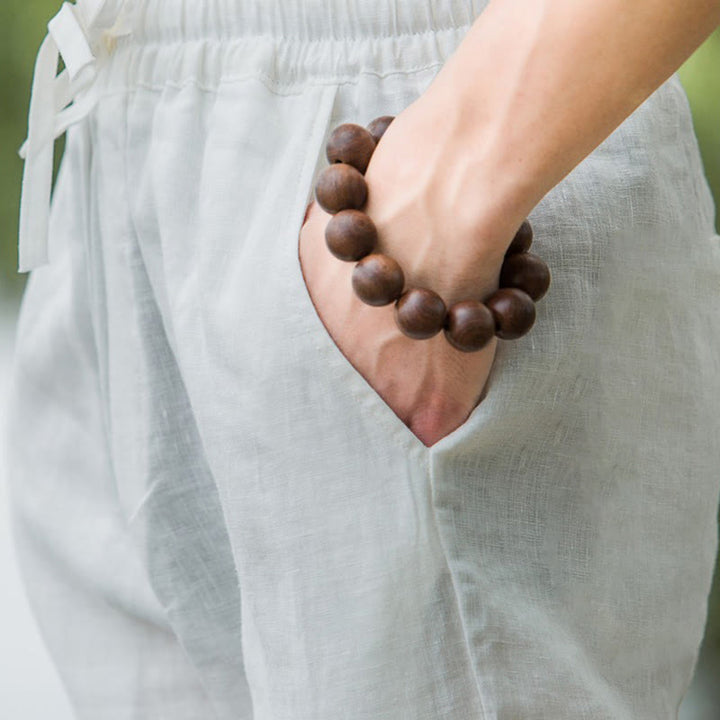 Pantalon large en coton et lin de couleur unie avec poches pour homme Buddha Stones - image 17