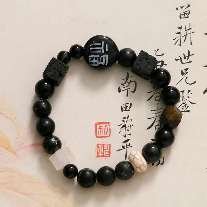 Bracelet en Buddha Stones avec onyx noir, céramique, agate, pierre noire scintillante, personnage de Fortune Fu