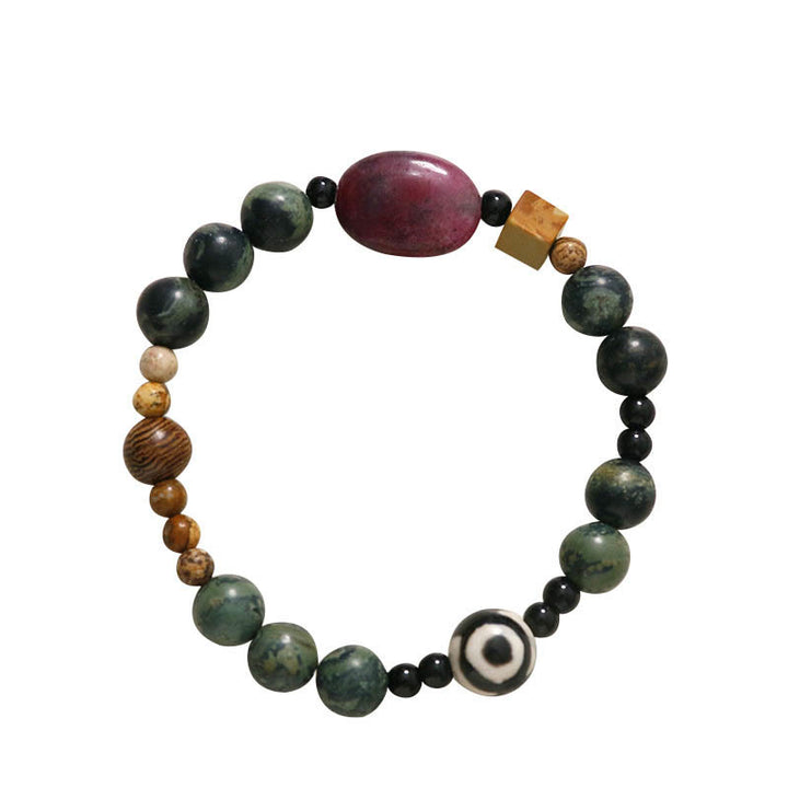 Bracelet de puissance et de succès en perles dzi à trois yeux en agate verte de Buddha Stones