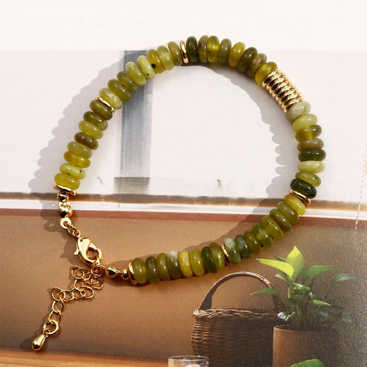 Bracelet de guérison et de réussite en jade cyan doré avec Buddha Stones