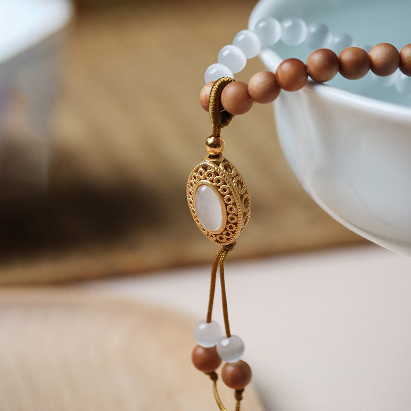 Bracelet de protection en cristal avec perles Dzi à trois yeux en œil de chat et bois de Buddha Stones