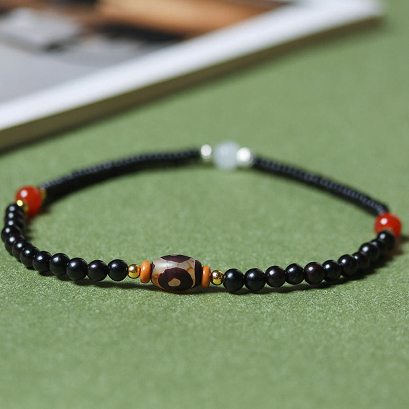 Bracelet double tour en perles de santal et dzi en ébène et bois de santal vert Buddha Stones