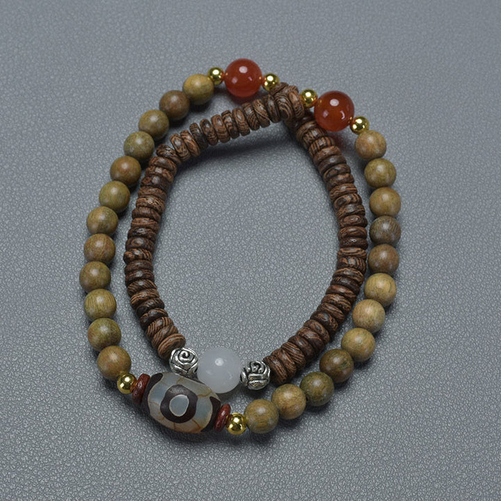 Bracelet double tour en perles de santal et dzi en ébène et bois de santal vert Buddha Stones