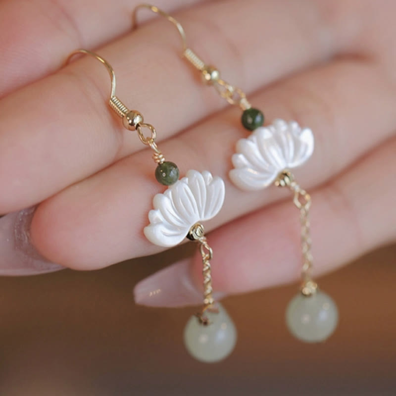 Boucles d'oreilles en jade Hetian avec Buddha Stones et lotus de prospérité