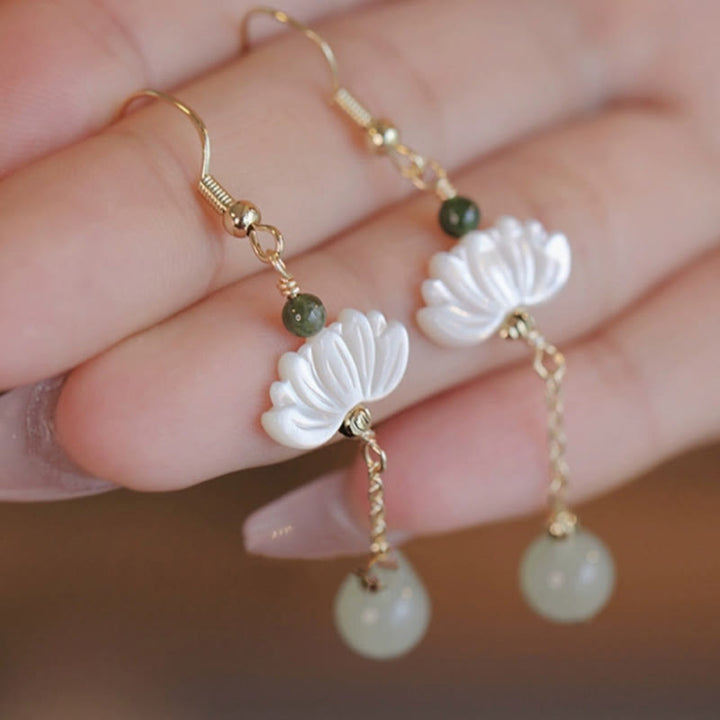 Boucles d'oreilles en jade Hetian avec Buddha Stones et lotus de prospérité