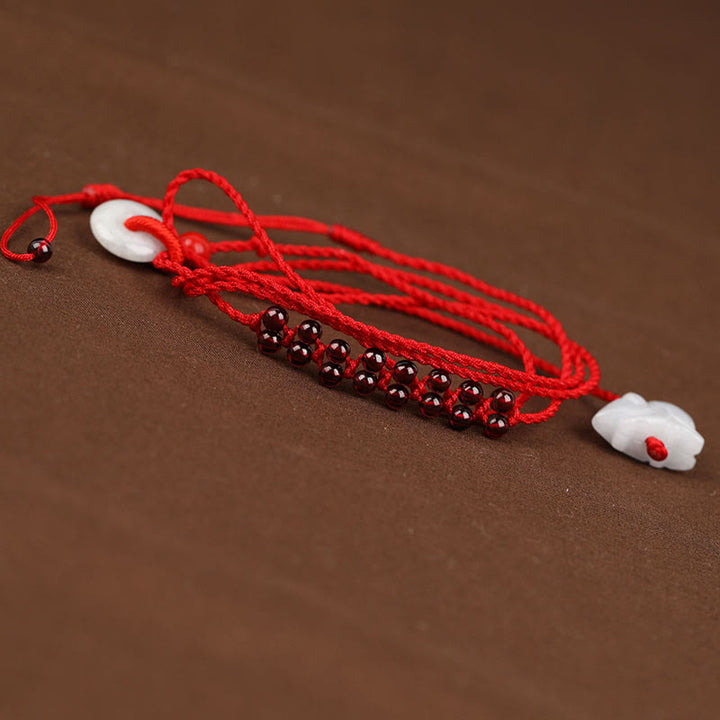 Buddha Stones Zodiaque chinois Grenat naturel Boucle de paix Bénédiction Chaîne de ventre en corde rouge