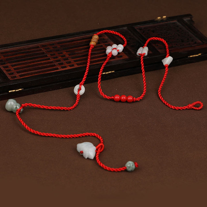 Chaîne de ventre en corde rouge avec bénédiction en bois de pêche et Buddha Stones