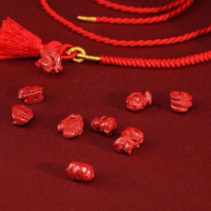 Chaîne de ventre en corde rouge avec bénédiction du dragon en cinabre naturel de Buddha Stones