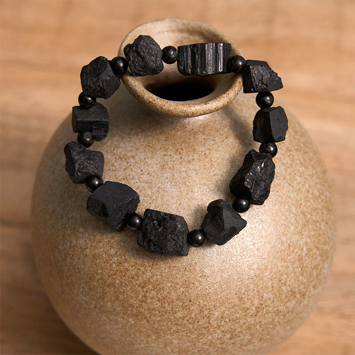 Bracelet positif en pierre irrégulière de tourmaline noire Buddha Stones