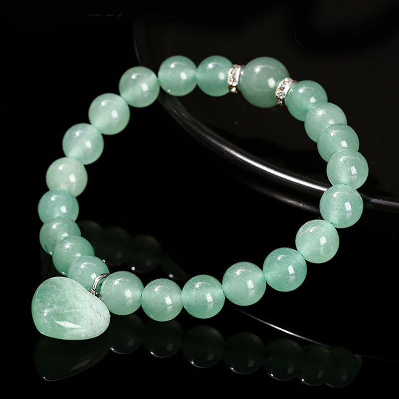 Bracelet d'équilibre en forme de cœur avec Buddha Stones et divers cristaux verts en aventurine. - image 10