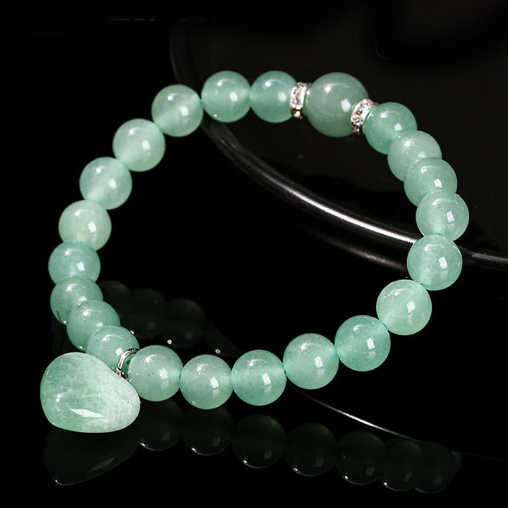 Bracelet d'équilibre en forme de cœur avec Buddha Stones et divers cristaux verts en aventurine. - image 10