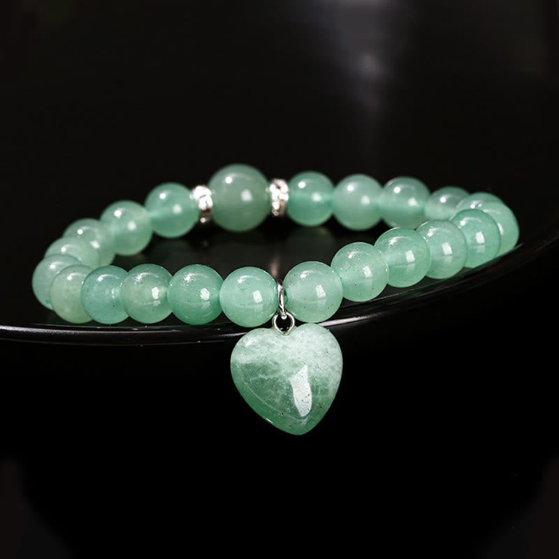 Bracelet d'équilibre en forme de cœur avec Buddha Stones et divers cristaux verts en aventurine. - image 11