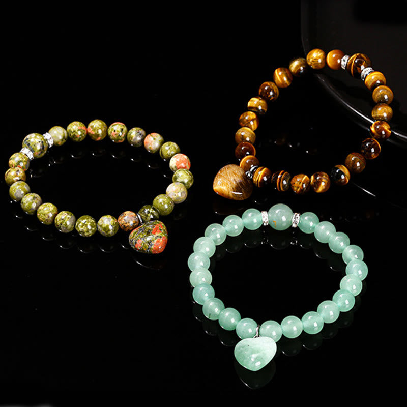 Bracelet d'équilibre en forme de cœur avec Buddha Stones et divers cristaux verts en aventurine. - image 29