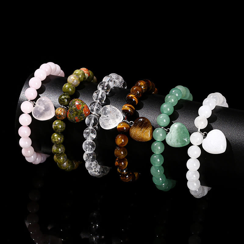 Bracelet d'équilibre en forme de cœur avec Buddha Stones et divers cristaux verts en aventurine. - image 1