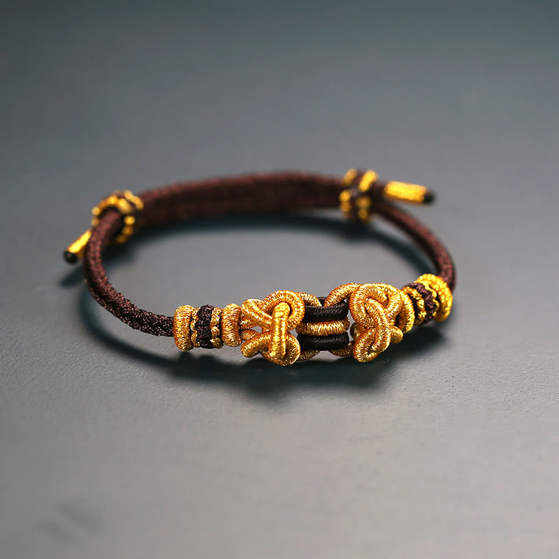 Bracelet de force en corde rouge avec nœud de selle et Buddha Stones
