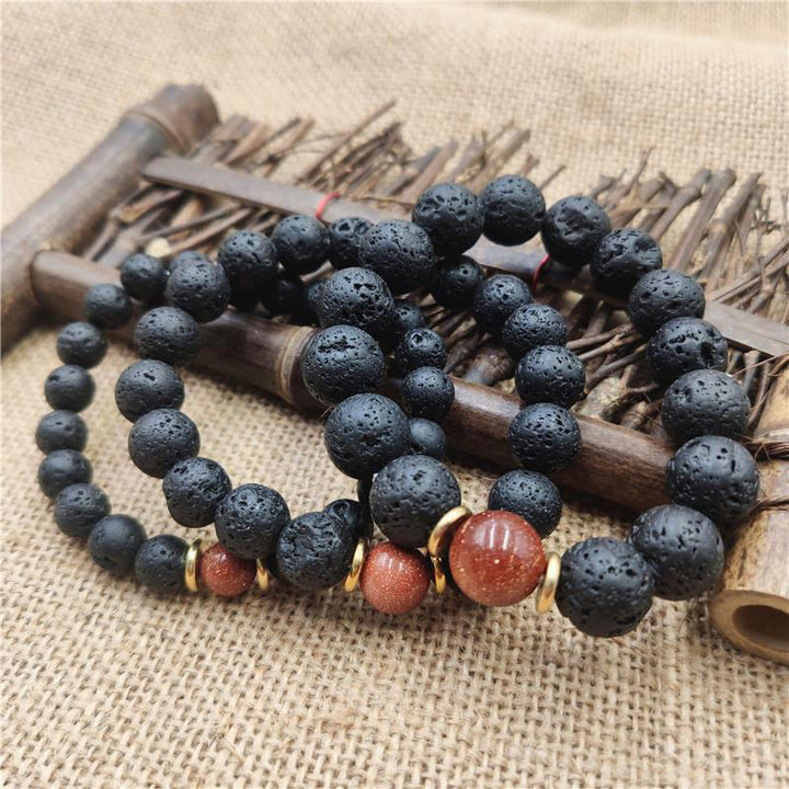 Bracelet de guérison en pierre de lave et grès bleu avec Buddha Stones