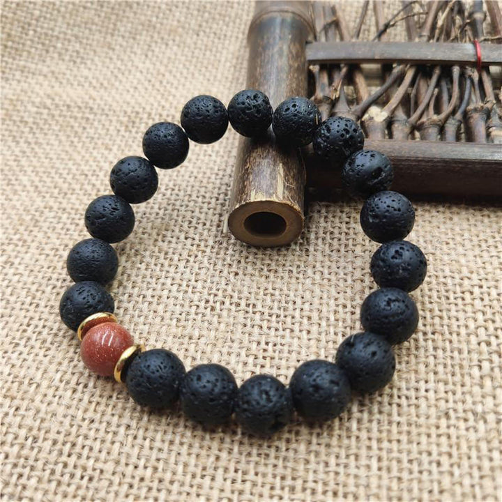 Bracelet de guérison en pierre de lave et grès bleu avec Buddha Stones