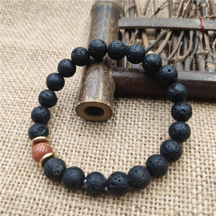 Bracelet de guérison en pierre de lave et grès bleu avec Buddha Stones