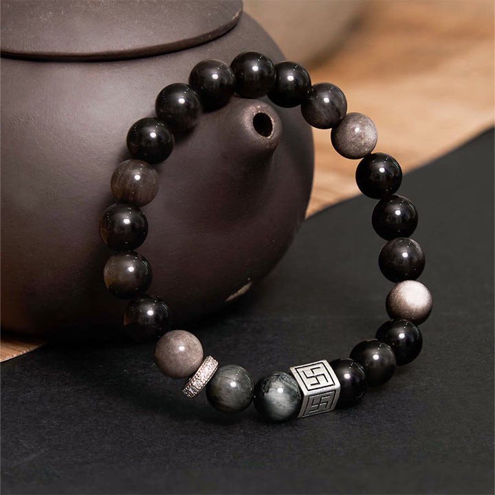 Bracelet force courage en obsidienne noire œil d'aigle Buddha Stones