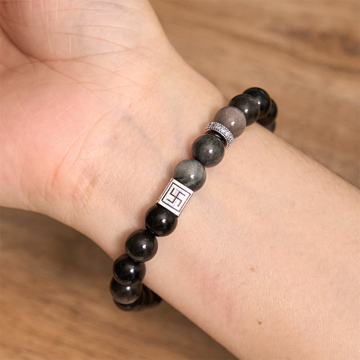 Bracelet force courage en obsidienne noire œil d'aigle Buddha Stones