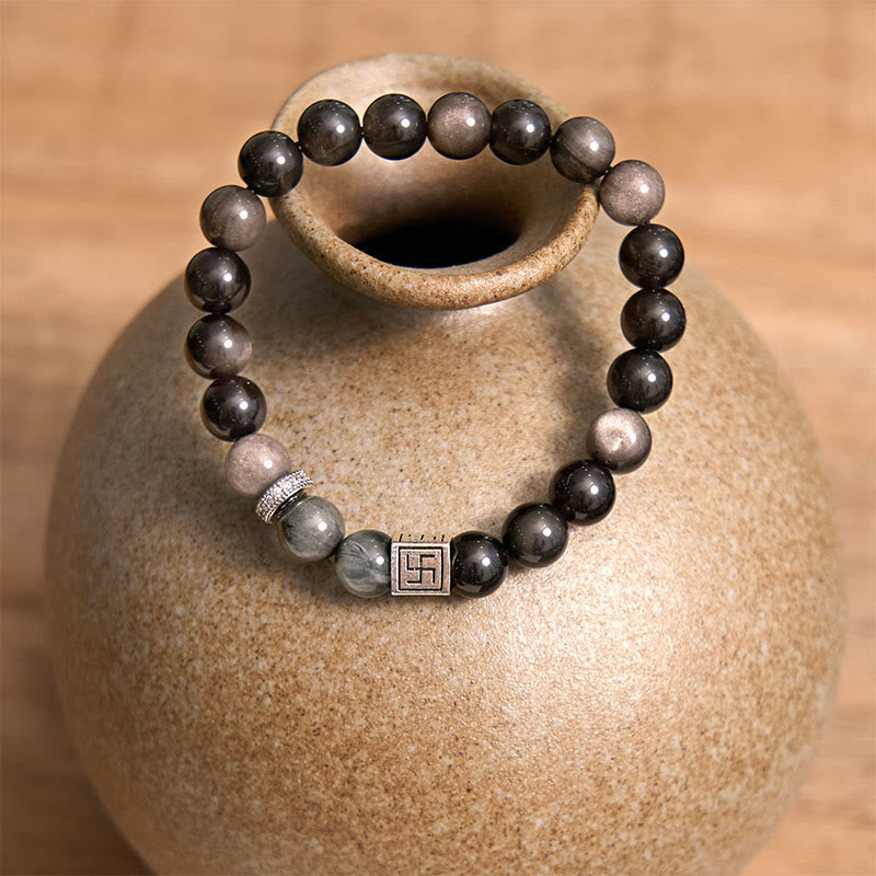 Bracelet force courage en obsidienne noire œil d'aigle Buddha Stones