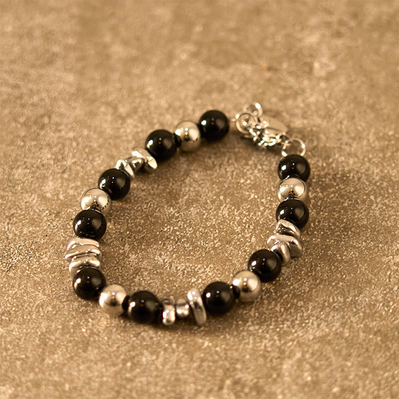Bracelet porte-bonheur en onyx noir et Buddha Stones