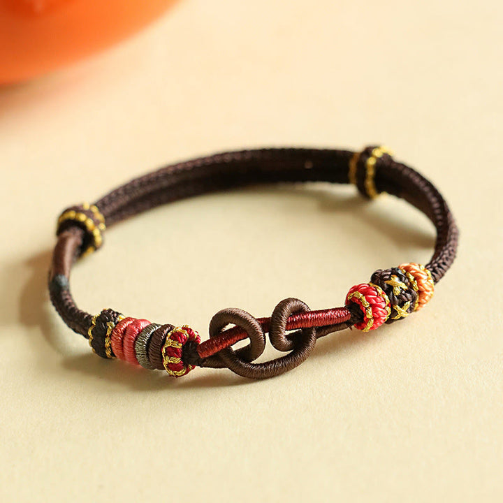 Bracelet de protection tressé à motif de lingot fait main avec Buddha Stones