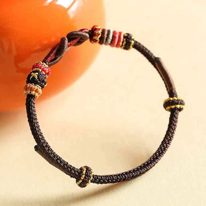 Bracelet de protection tressé à motif de lingot fait main avec Buddha Stones