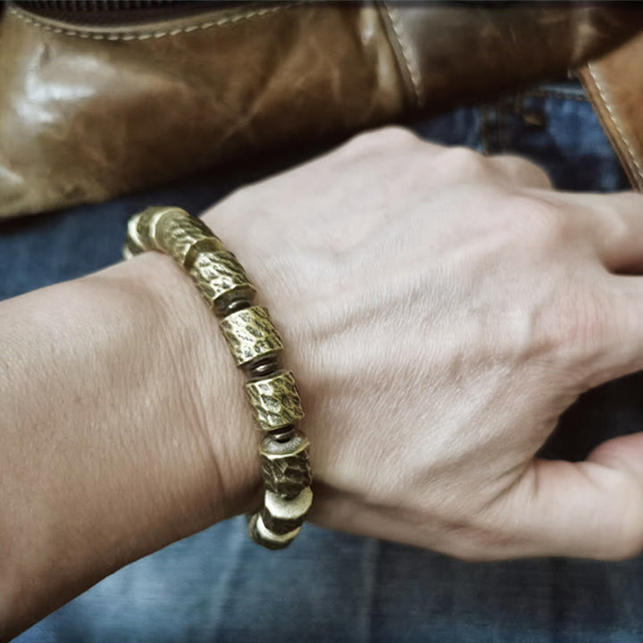 Bracelet porte-bonheur en cuivre avec motif de cratère de météorite et Buddha Stones