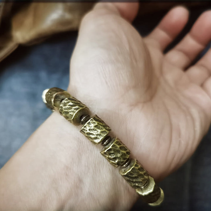 Bracelet porte-bonheur en cuivre avec motif de cratère de météorite et Buddha Stones