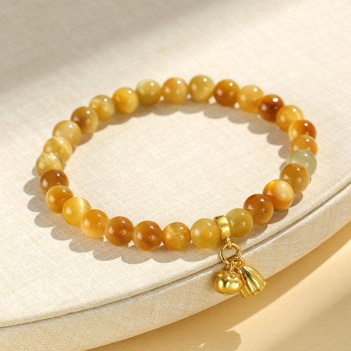 Bracelet de Protection œil de tigre, pierres de Buddha Stones , personnage Fu, bambou, poisson Koi, Lotus Om Mani Padme Hum