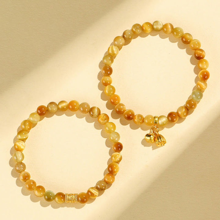 Bracelet de Protection œil de tigre, pierres de Buddha Stones , personnage Fu, bambou, poisson Koi, Lotus Om Mani Padme Hum