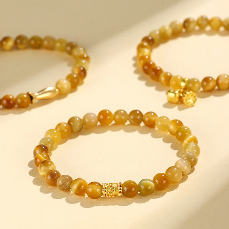 Bracelet de Protection œil de tigre, pierres de Buddha Stones , personnage Fu, bambou, poisson Koi, Lotus Om Mani Padme Hum