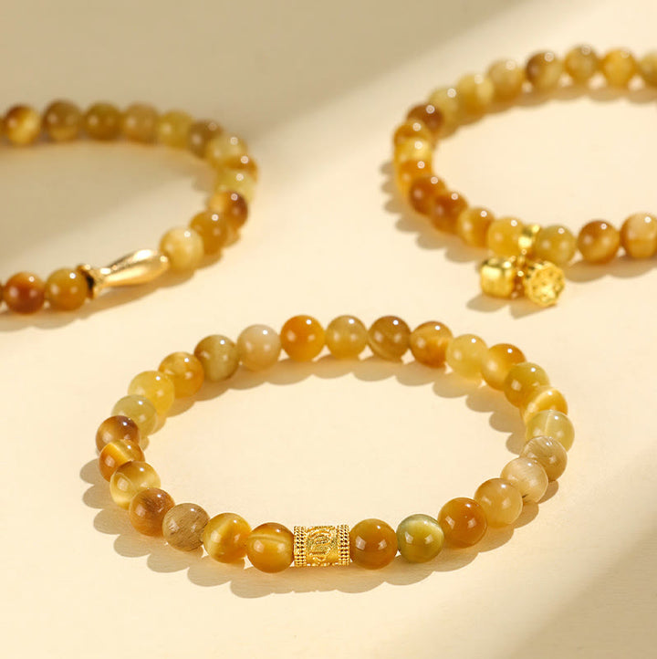 Bracelet de Protection œil de tigre, pierres de Buddha Stones , personnage Fu, bambou, poisson Koi, Lotus Om Mani Padme Hum