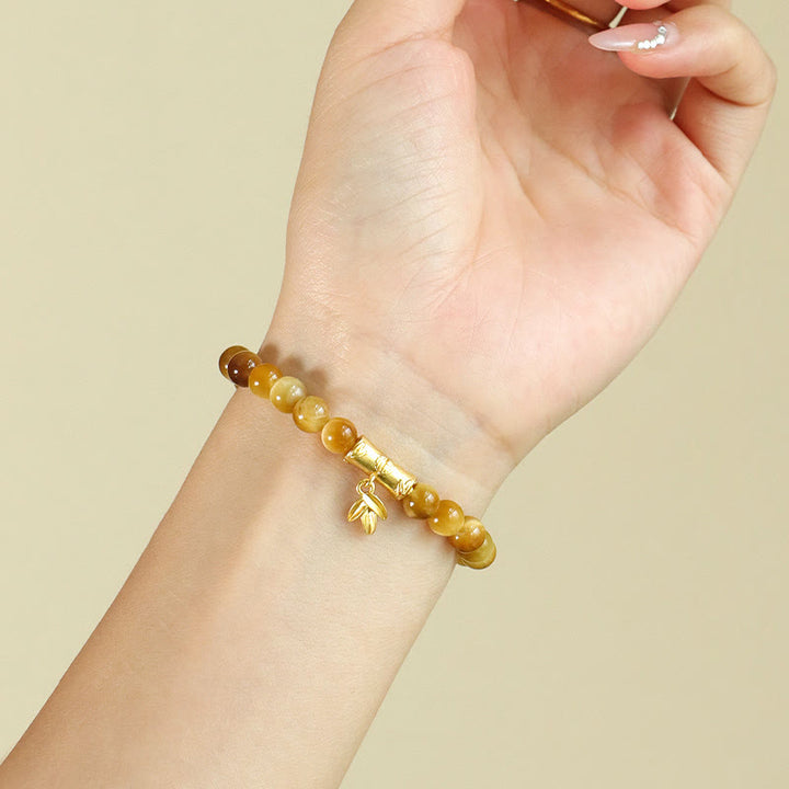 Bracelet de Protection œil de tigre, pierres de Buddha Stones , personnage Fu, bambou, poisson Koi, Lotus Om Mani Padme Hum