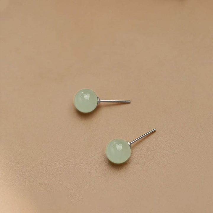 Boucles d'oreilles à tige en Buddha Stones - image 3