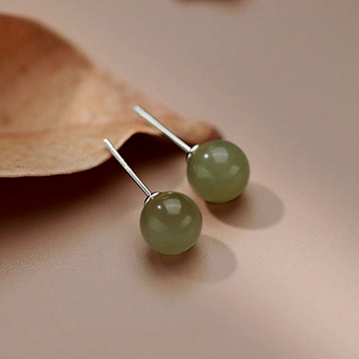 Boucles d'oreilles à tige en Buddha Stones - image 11
